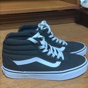 Black and White high top Vans sneakers